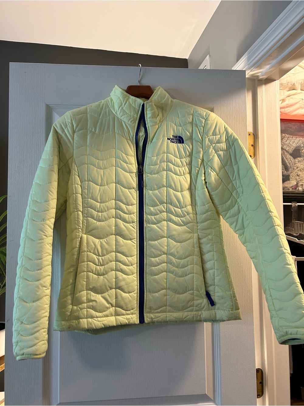 The North Face Women's Pale Lime Quilted Puffer Jacket with Blue Trim